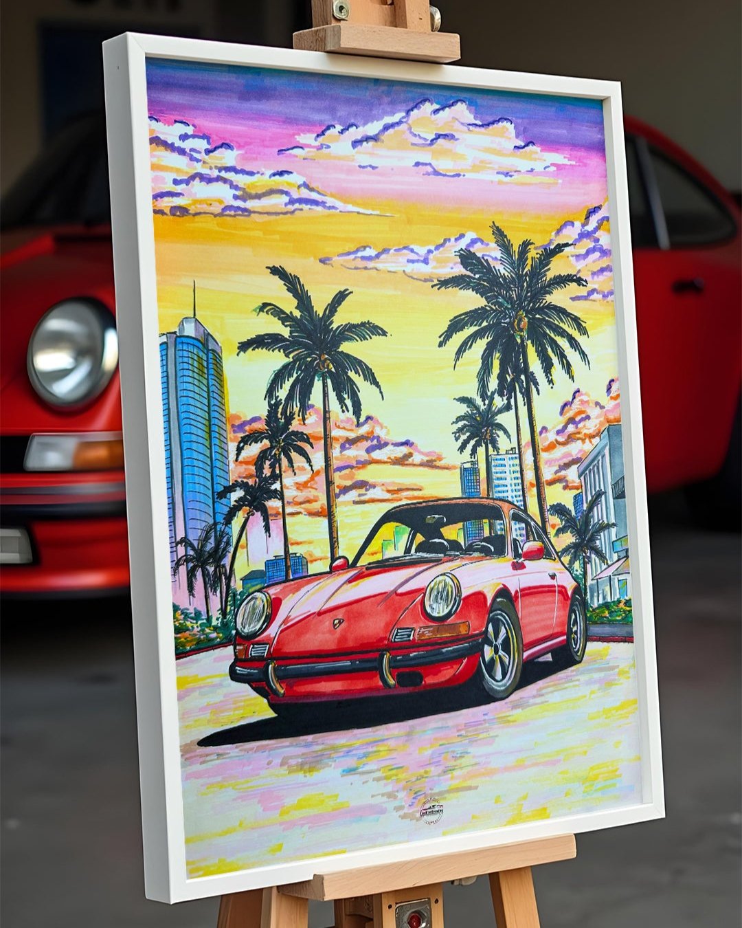 porsche carrera 972 poster, calssic car poster in frame in front of the porsche car