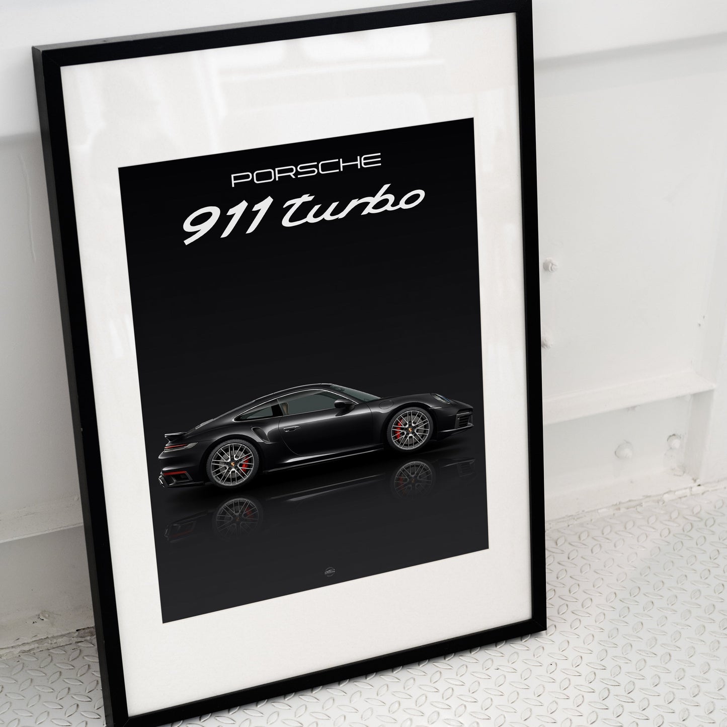 porsche turbo poster in frame on ground
