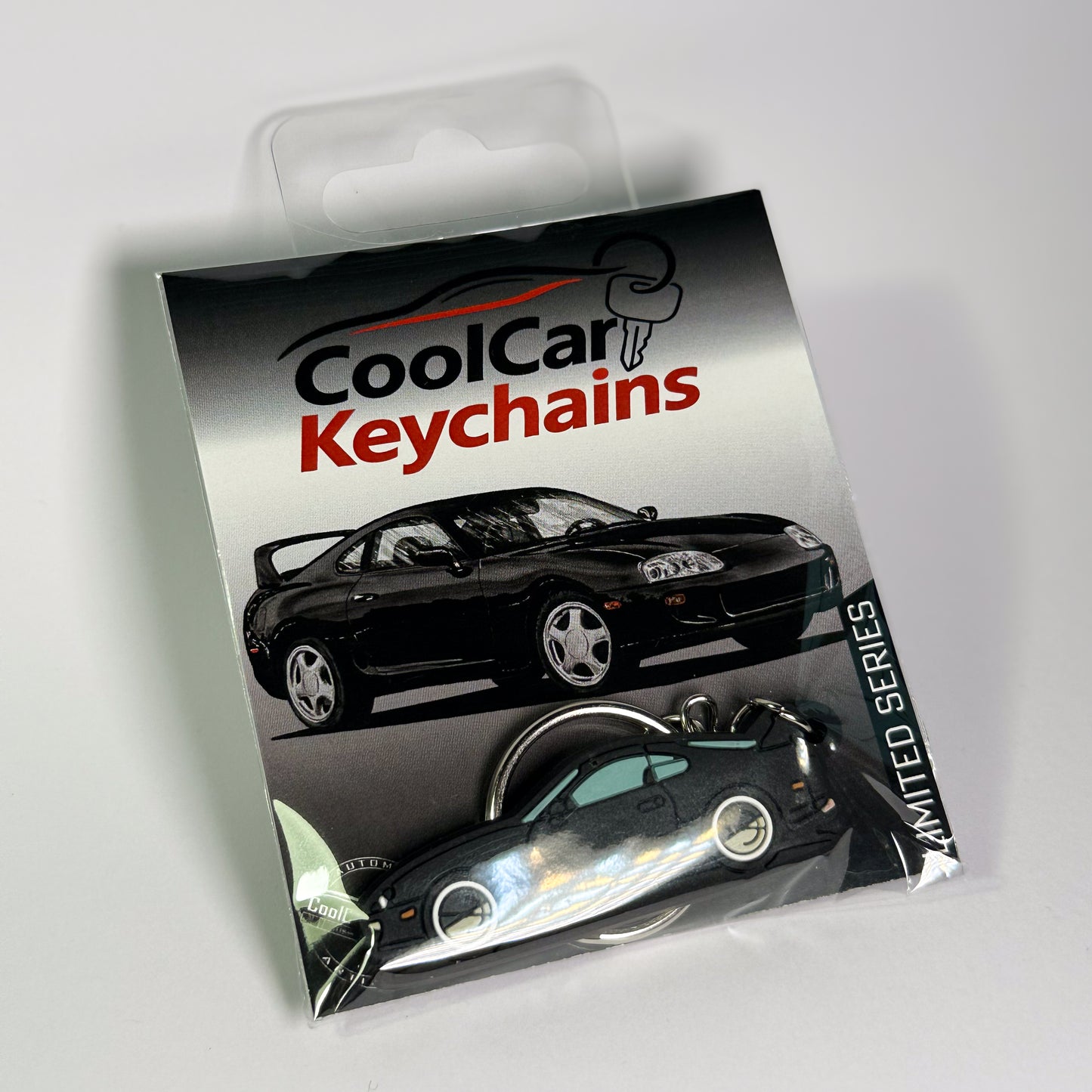 black supra mk4 keychain in plastic bag, pvc car keychain