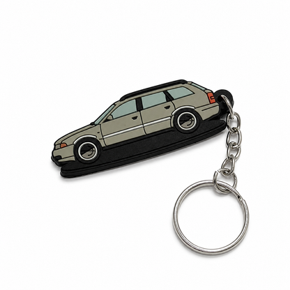 Keychain Audi A4 car grey colour on a white background