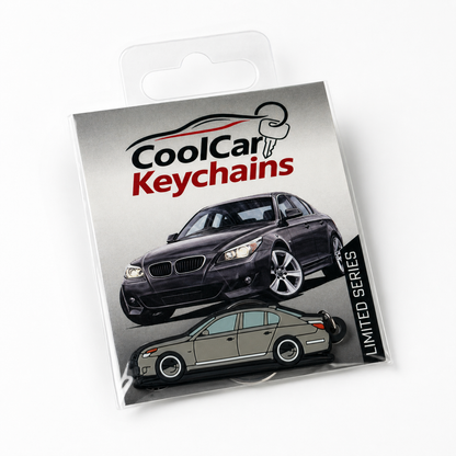 Packaging of CoolCar Keychains with grey BMW E60 keychain on a white background