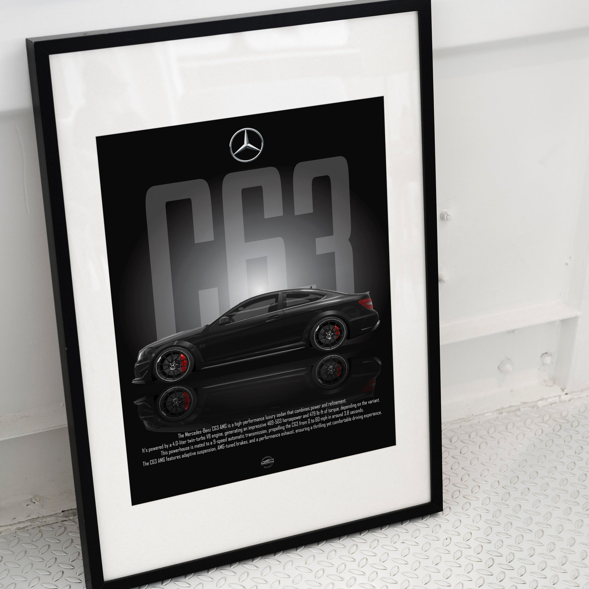 Framed poster of a Mercedes-Benz car with the model number 'C63' on a white surface.