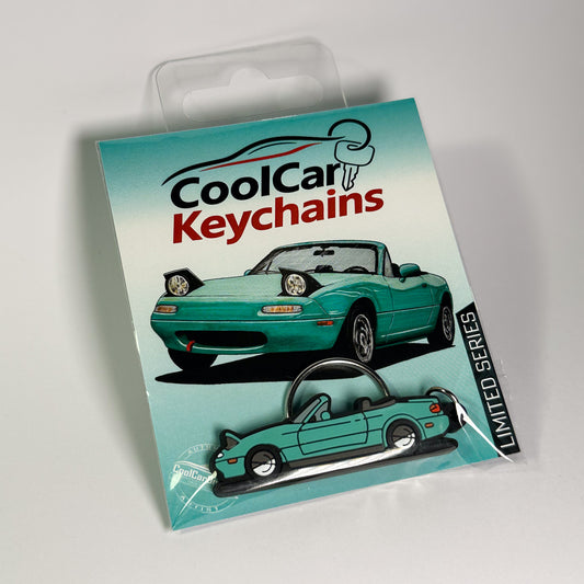 mint miata keychain in plastic bag