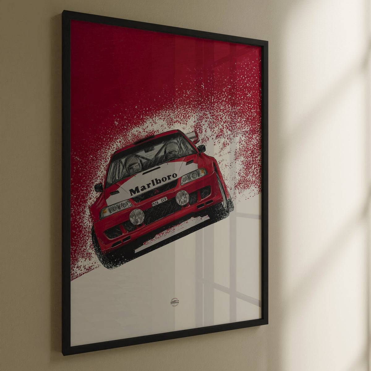 Framed artwork of a red Mitsubishi rally car with 'Marlboro' branding on a beige wall.