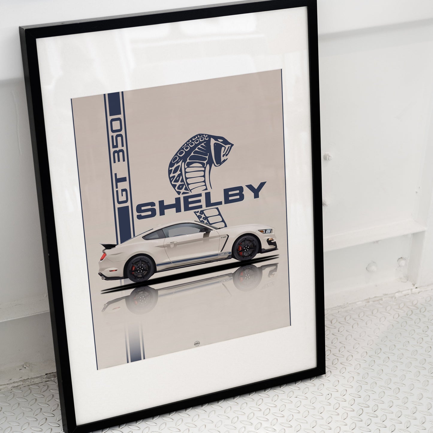 Framed artwork of a Shelby car design on a white surface