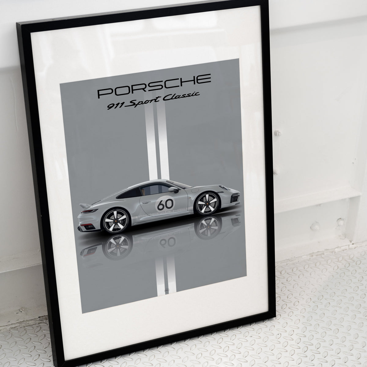 Porsche 911 Sport poster in grey colour in black frame on ground