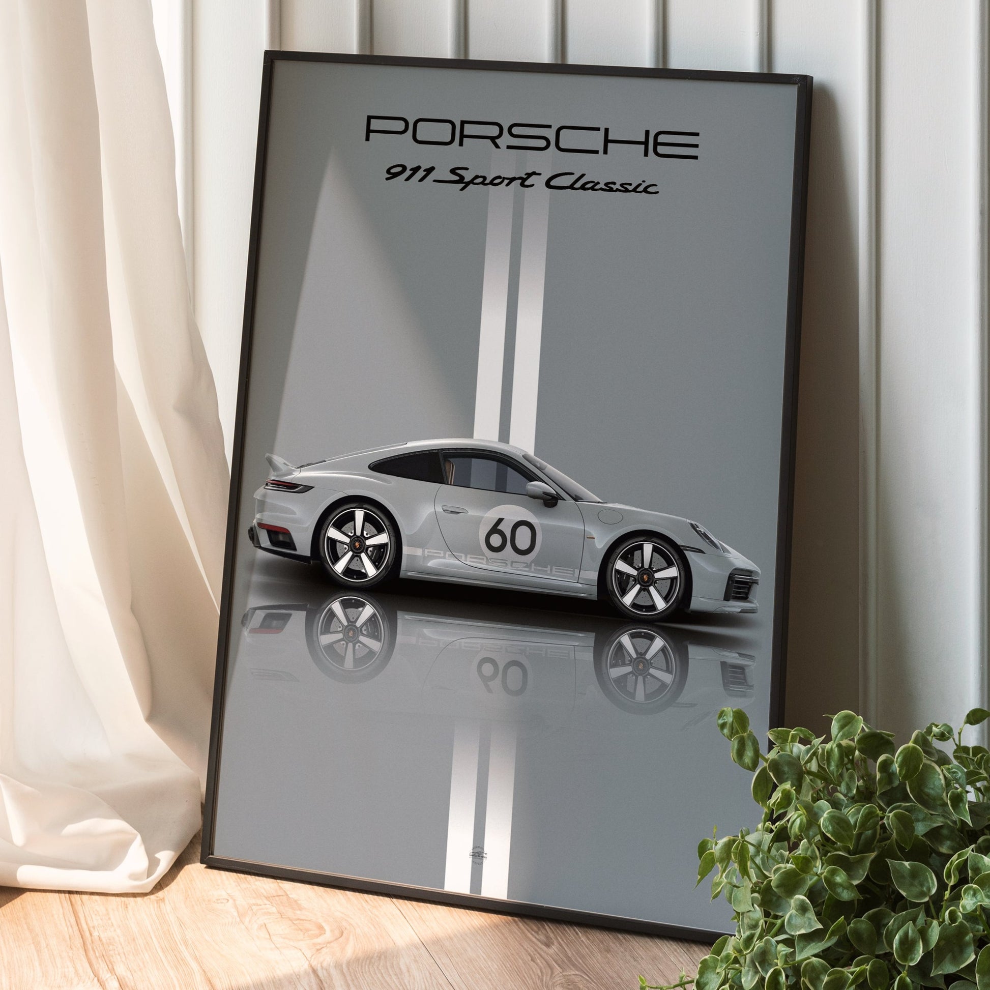 Porsche 911 Sport Poster in black frame placed on ground
