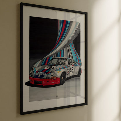 A framed art print of a vintage Porsche Carerra with Martini livery and with colorful abstract stripes, displayed on a beige wall with soft window light casting shadows.