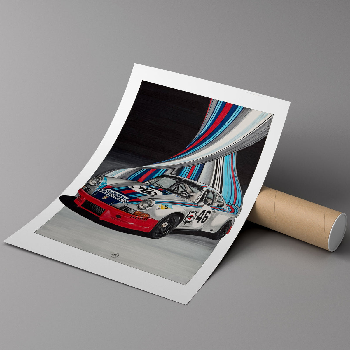 A printed art poster showing a Martini livery Porsche Carerra car, displayed on a gray surface 