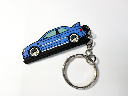 PVC keychain featuring a blue Subaru 22B rally car – JDM collectible