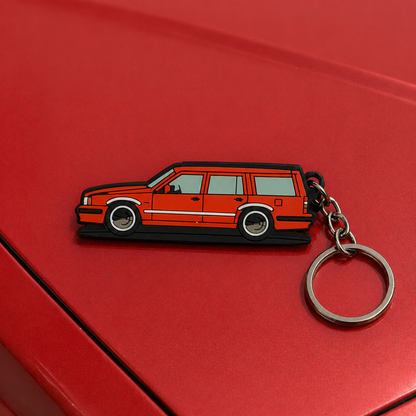 Volvo Keychain red car on a red surface
